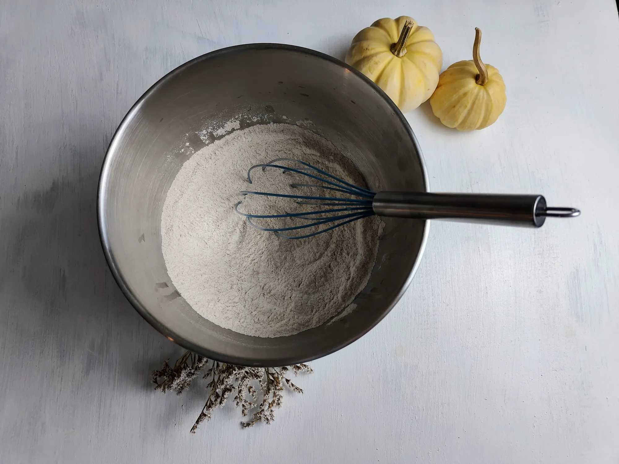 Dry ingredients in a bowl, with a whisk